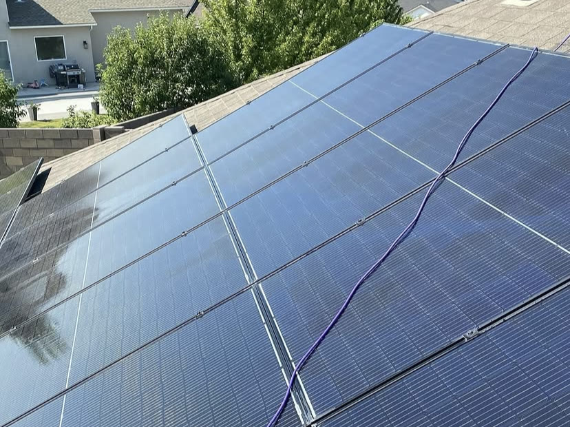 Rooftop solar array before and after cleaning, dust layer removed (after)